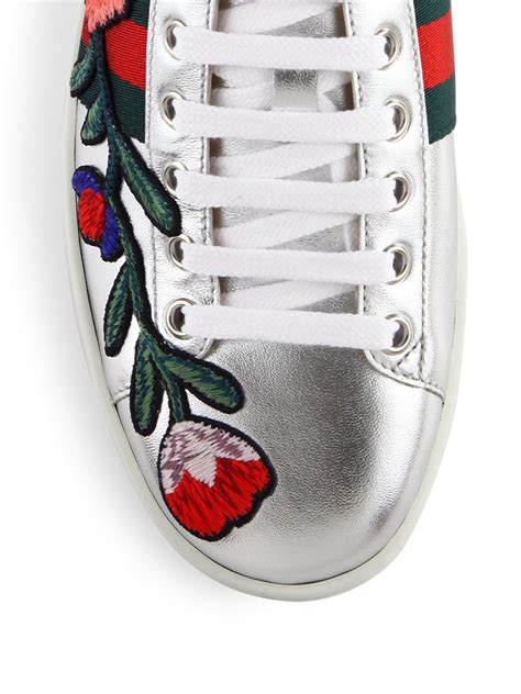 silver floral gucci sneakers|Gucci ace embellished leather sneakers.